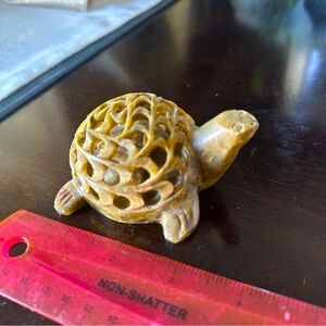 Hand carved stone turtle with baby inside
